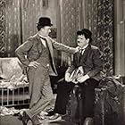 Oliver Hardy and Stan Laurel in Block-Heads (1938)