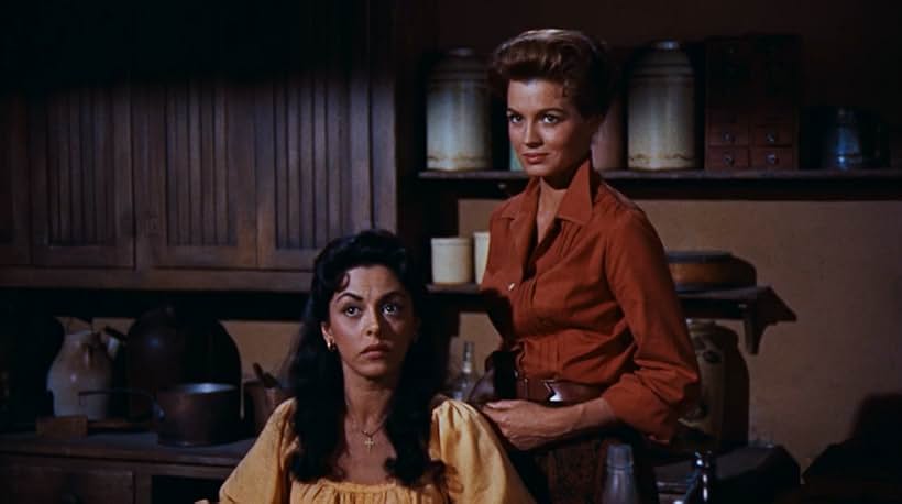 Angie Dickinson and Estelita Rodriguez in Rio Bravo (1959)