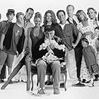 Kirk Douglas, Michael J. Fox, Kirsten Dunst, Bob Balaban, Ed Begley Jr., Nancy Travis, Olivia d'Abo, Eric Lloyd, Sean Babb, Jere Burns, Colleen Camp, Siobhan Fallon Hogan, Phil Hartman, Adam Hendershott, Joyce Hyser, Jonathan Lynn, Mary Ellen Trainor, and Lisa Bradley in Greedy (1994)