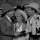 Pat O'Brien, Priscilla Lane, and Dick Powell in Cowboy from Brooklyn (1938)