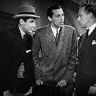 Leslie Howard, Cesar Romero, and Phillip Reed in British Agent (1934)