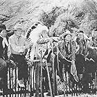 Iron Eyes Cody, George Sky Eagle, and Chief Yowlachie in King of the Stallions (1942)