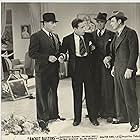 Humphrey Bogart, George Brent, Bruce Mitchell, and Jack Mower in Racket Busters (1938)