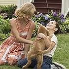 Josh Gad, Juliet Rylance, and Bryce Gheisar in A Dog's Purpose (2017)