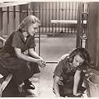 Sheila Bromley and Jane Bryan in Girls on Probation (1938)