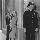 John Garfield, Priscilla Lane, and Jack Mower in Dust Be My Destiny (1939)