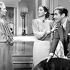 John Boles, Alma Kruger, and Rosalind Russell in Craig's Wife (1936)