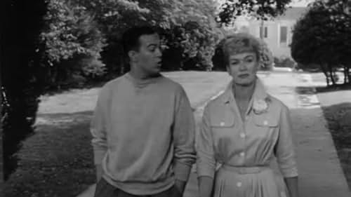 Miss Brooks teaches English at Madison High, rents a room from Mrs. Davis, gets rides to school with student Walter, fights with Principal Conklin, and tries to snag shy biology teacher Boynton. In the last year she switches to Mrs. Nestor's private school.