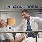 George Wyner and Ryan Eggold in New Amsterdam (2018)