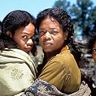 Oprah Winfrey, Kimberly Elise, and Thandiwe Newton in Beloved (1998)