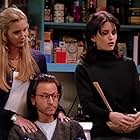 Courteney Cox, Lisa Kudrow, and Fisher Stevens in Friends (1994)