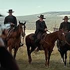 Rosamund Pike and Scott Wilson in Hostiles (2017)