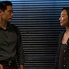 Teo Yoo and Greta Lee in Past Lives (2023)