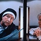 Eric Idle and Camille Coduri in Nuns on the Run (1990)