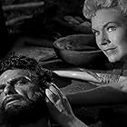 Henry Brandon and Shirley Patterson in The Land Unknown (1957)