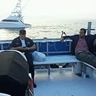 End of a day BTS of CAPTAIN PHILLIPS. Omar Berdouni and I relax as our water taxi takes is back to shore.