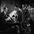 Leslie Howard, Cesar Romero, William Gargan, and Phillip Reed in British Agent (1934)