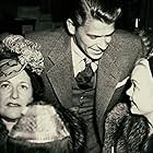 Ronald Reagan, Louella Parsons, and Jane Wyman in The Reagans (2020)