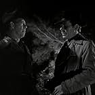 Walter Baldwin and Kenneth MacDonald in The Devil Commands (1941)