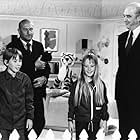 Donald Pleasence, Ray Milland, Kim Richards, and Ike Eisenmann in Escape to Witch Mountain (1975)