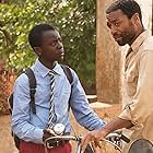 Chiwetel Ejiofor and Maxwell Simba in The Boy Who Harnessed the Wind (2019)