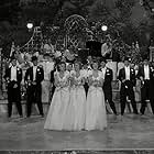 Laverne Andrews, Maxene Andrews, Patty Andrews, and Ted Lewis in Hold That Ghost (1941)