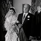 Elizabeth Taylor, Spencer Tracy, and Melville Cooper in Father of the Bride (1950)