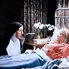 Eric Idle and Camille Coduri in Nuns on the Run (1990)