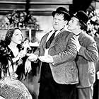 Oliver Hardy, Stan Laurel, and Lupe Velez in Hollywood Party (1934)