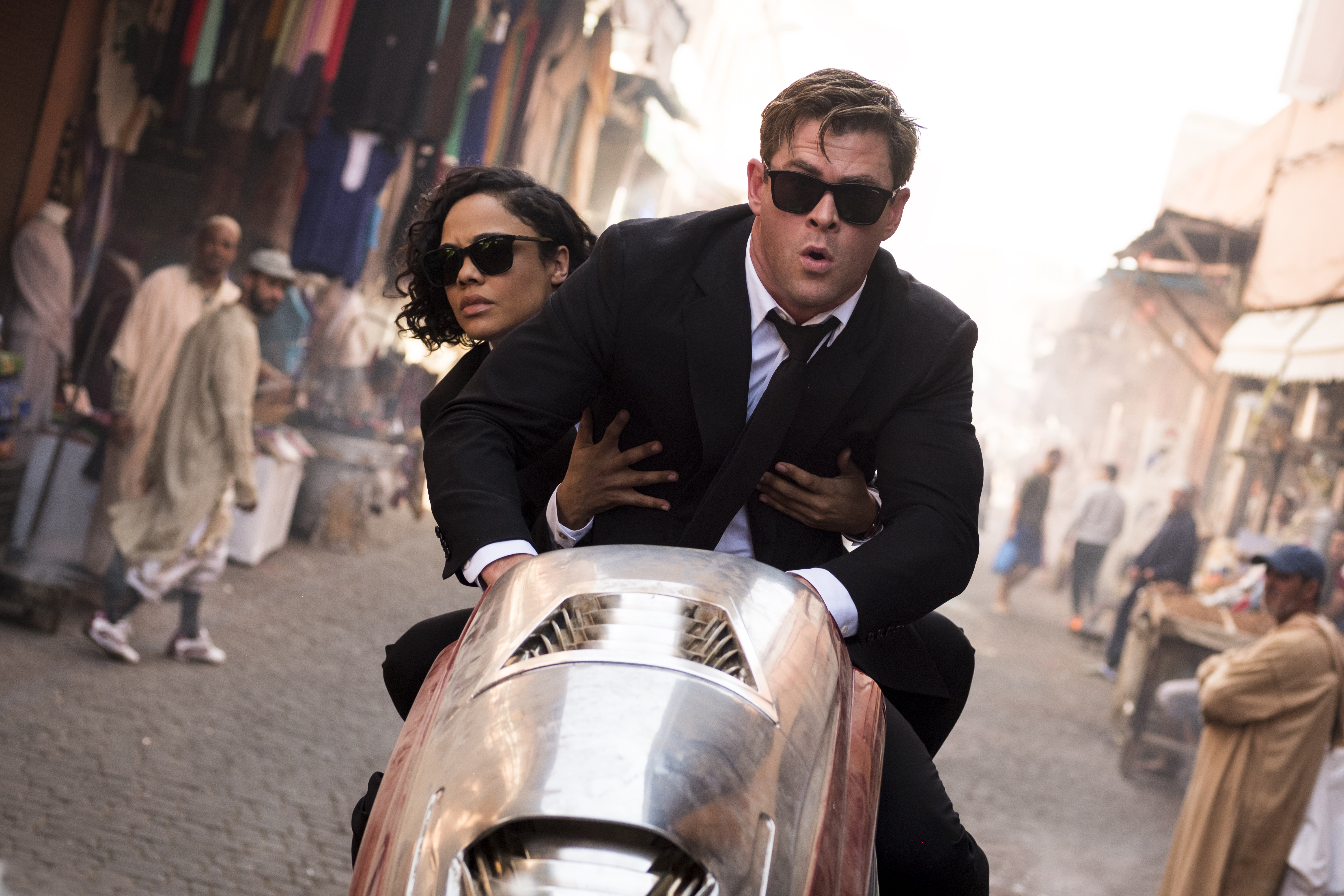 Chris Hemsworth, Tessa Thompson, and Younes Afroukh in Men in Black: International (2019)