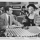 Douglas Kennedy and Beverly Michaels in East Side, West Side (1949)