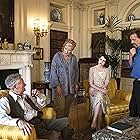 Emma Thompson, Jim Broadbent, Hugh Laurie, and Lucy Boynton in Why Didn't They Ask Evans? (2022)