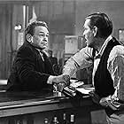 Edward G. Robinson and Max Wagner in Illegal (1955)