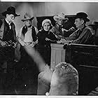 Yakima Canutt, Peggy Djarling, Franklyn Farnum, Fred Parker, and Hal Taliaferro in Carrying the Mail (1934)