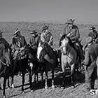 James Arness, Lane Bradford, Richard Evans, Raymond Hatton, Robert Karnes, Tyler McVey, and Dennis Weaver in Gunsmoke (1955)