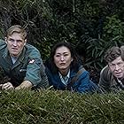 Wyatt Russell, Anders Holm, and Mari Yamamoto in Monarch: Legacy of Monsters (2023)