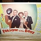 Charley Grapewin, George Raft, and Vera Zorina in Follow the Boys (1944)