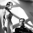 Raymond Burr and Lizabeth Scott in Pitfall (1948)