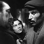 Franco Navarra, Saro Urzì, and Elena Varzi in The Path of Hope (1950)