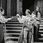 Peter Cushing, Eileen Herlie, and Basil Sydney in Hamlet (1948)