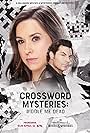 Lacey Chabert and Brennan Elliott in Crossword Mysteries: Riddle Me Dead (2021)