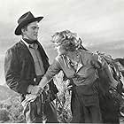 Kirk Douglas and Virginia Mayo in Along the Great Divide (1951)