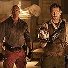 Ryan Reynolds and Dwayne Johnson in Red Notice (2021)