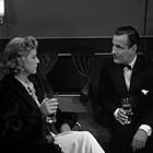 Tom Conway and Karen Verne in Sky Murder (1940)