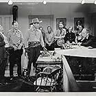 Lynton Brent, Johnny Mack Brown, Earle Hodgins, Fuzzy Knight, Dennis Moore, Tex Ritter, and Hank Worden in Tenting Tonight on the Old Camp Ground (1943)