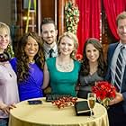 Lacey Chabert, Brenda Crichlow, Jason McKinnon, Paul Greene, and Andrea Brooks in A Wish For Christmas (2016)