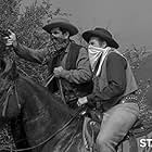 Kem Dibbs and Kevin Hagen in Tales of Wells Fargo (1957)