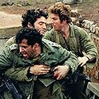 Juliano Mer-Khamis, Liron Levo, and Tomer Russo in Kippur (2000)