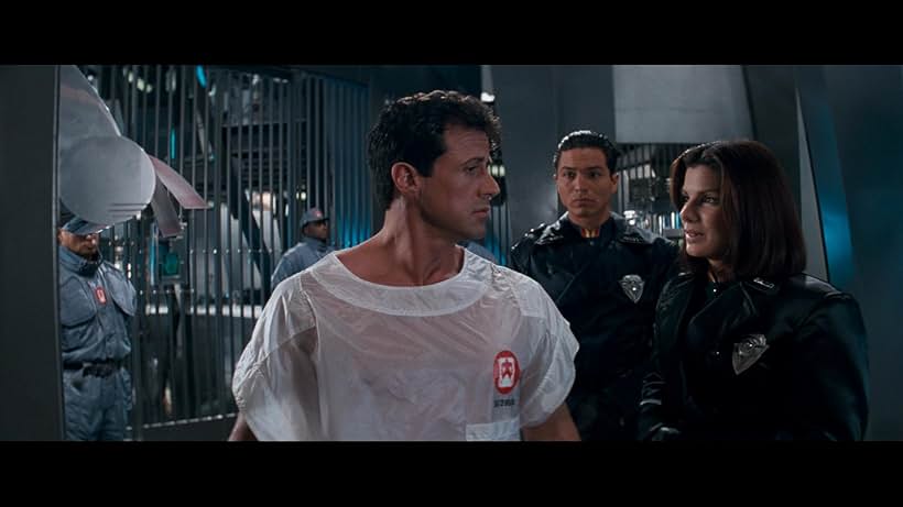Sandra Bullock, Sylvester Stallone, and Benjamin Bratt in Demolition Man (1993)
