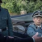 Claus Flygare and Mads Hjulmand in Out of the Darkness (2022)